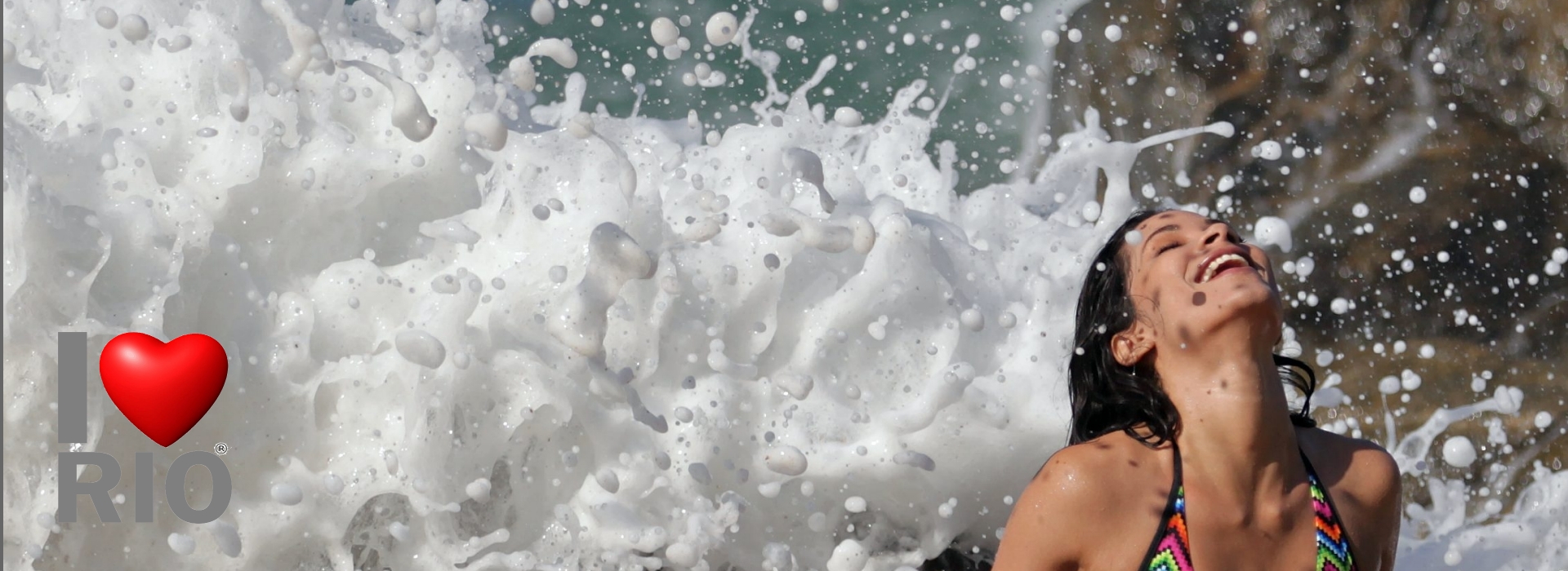  Rio de Janeiro, Brazil - woman enjoying waves at prainha beach